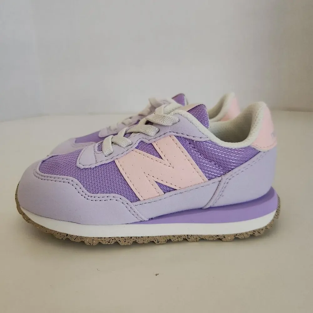 New Balance Kid's 237 V1 Bungee Sneaker, Lilac Glo/Shell Pink, 9 M Toddler